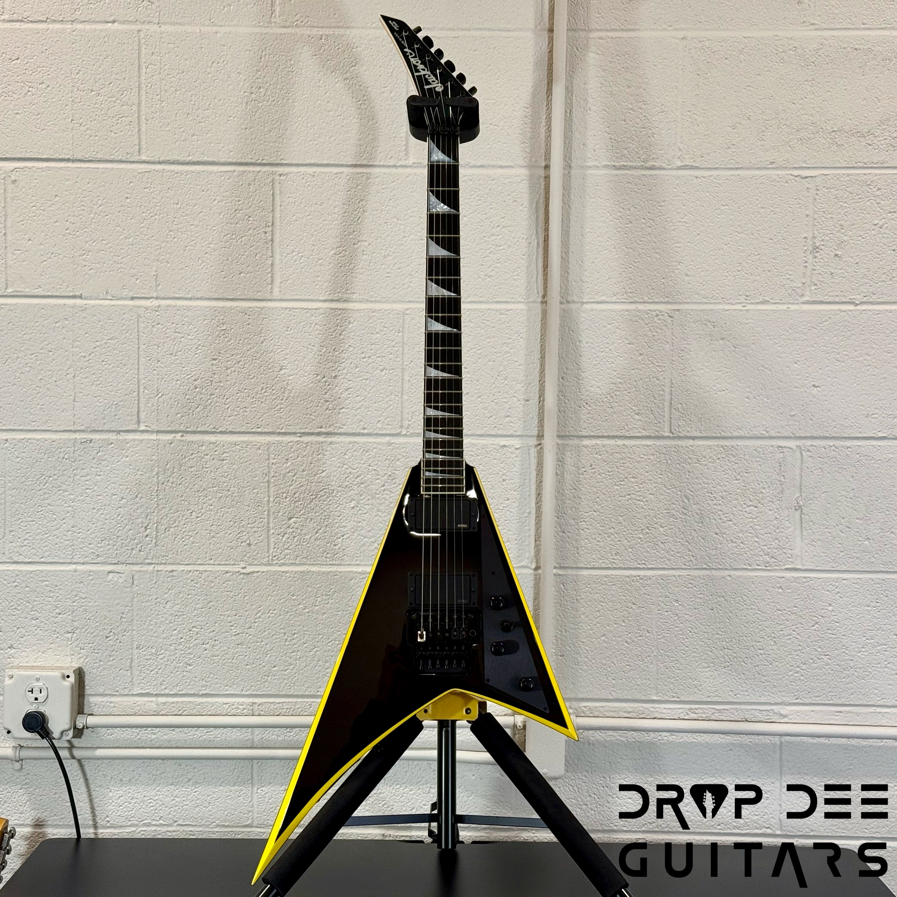 Jackson Custom Shop Randy Rhoads Electric Guitar w/ Case - Black w/ Yellow Pinstripes
