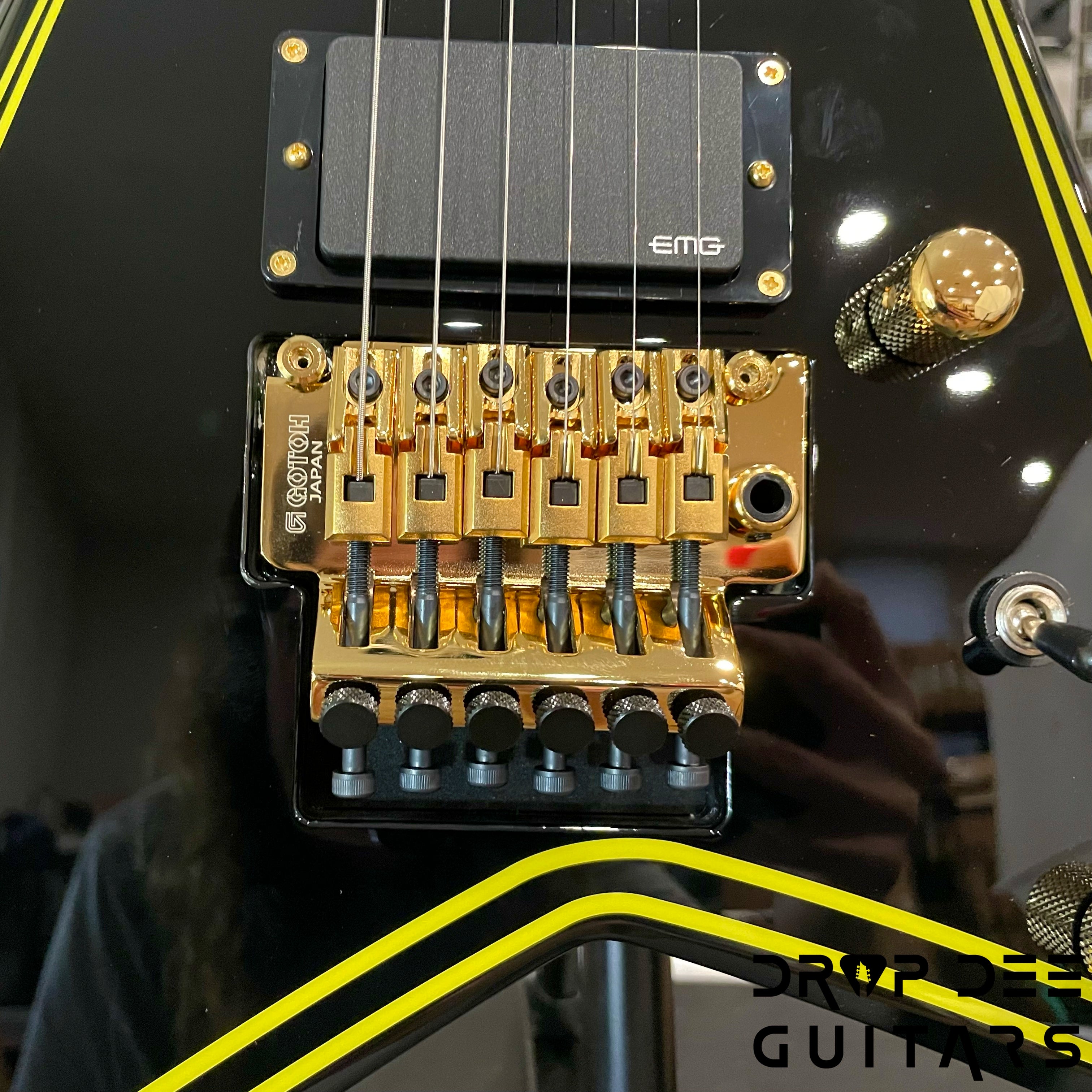 Jackson MJ Series Rhoads RR24MG Electric Guitar w/ Case - Black with Yellow Pinstripes