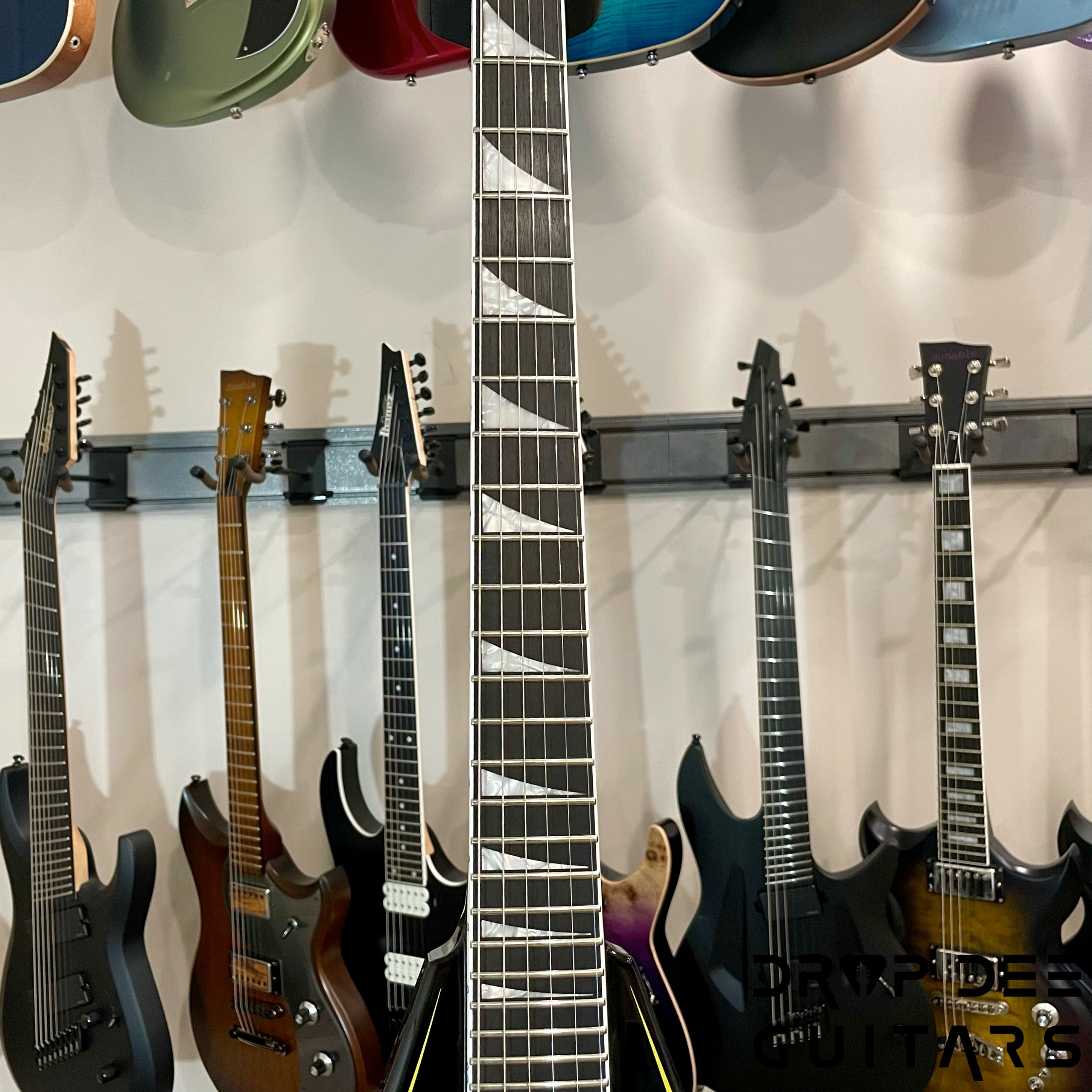 Jackson MJ Series Rhoads RR24MG Electric Guitar w/ Case - Black with Yellow Pinstripes
