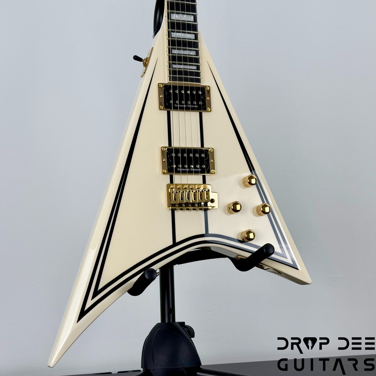Jackson Legend Series Limited Edition Signature Randy Rhoads CD1 Electric Guitar w/ Case - Vintage White with Black Pinstripes