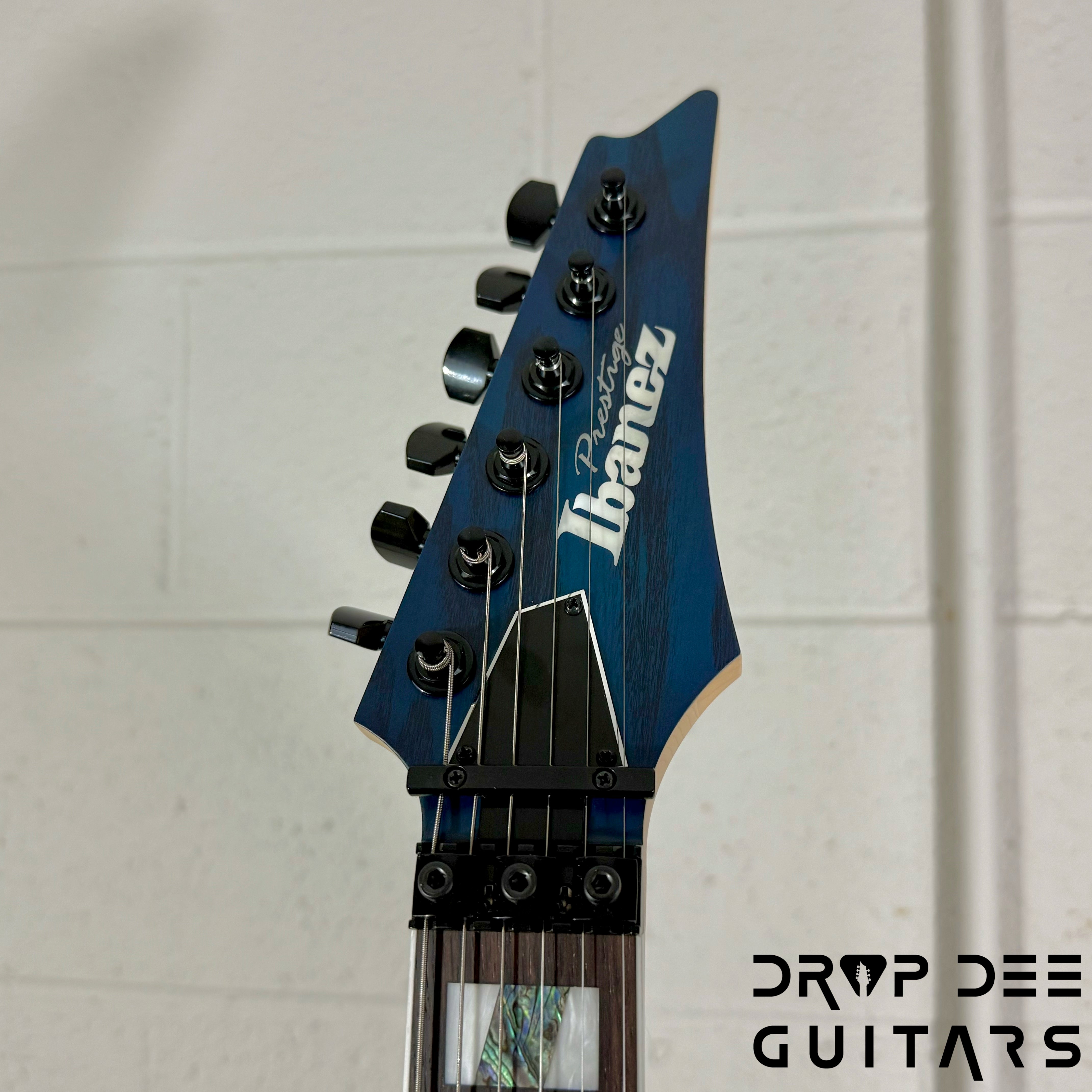 Ibanez Prestige RG653DX Electric Guitar w/ Case - Transparent Deep Blue Flat